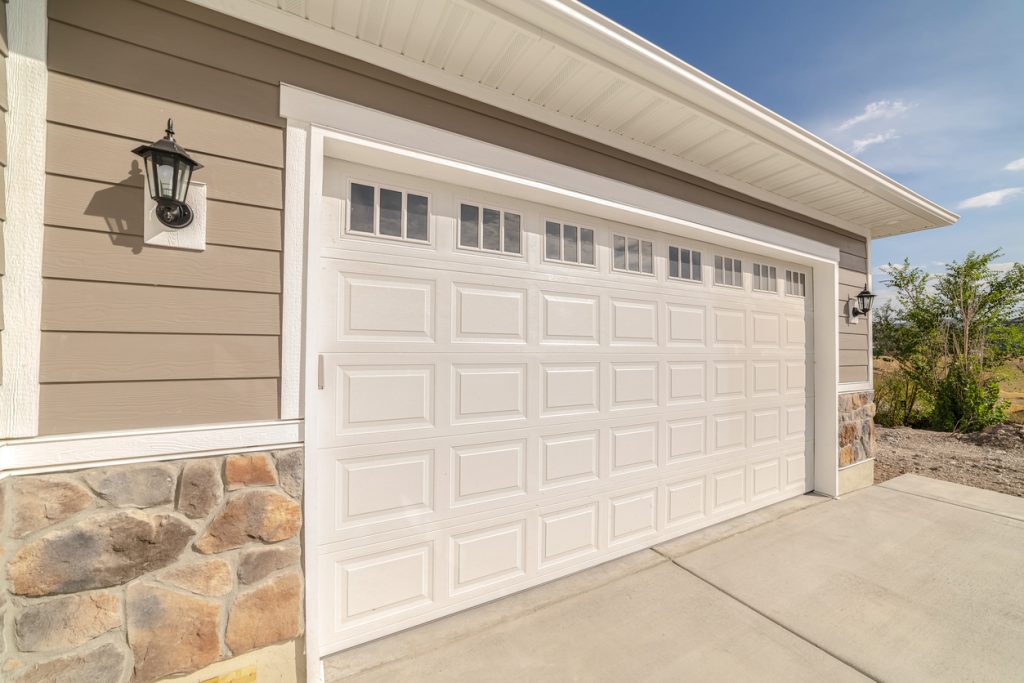 Double garage of modern home on sunny, clear day